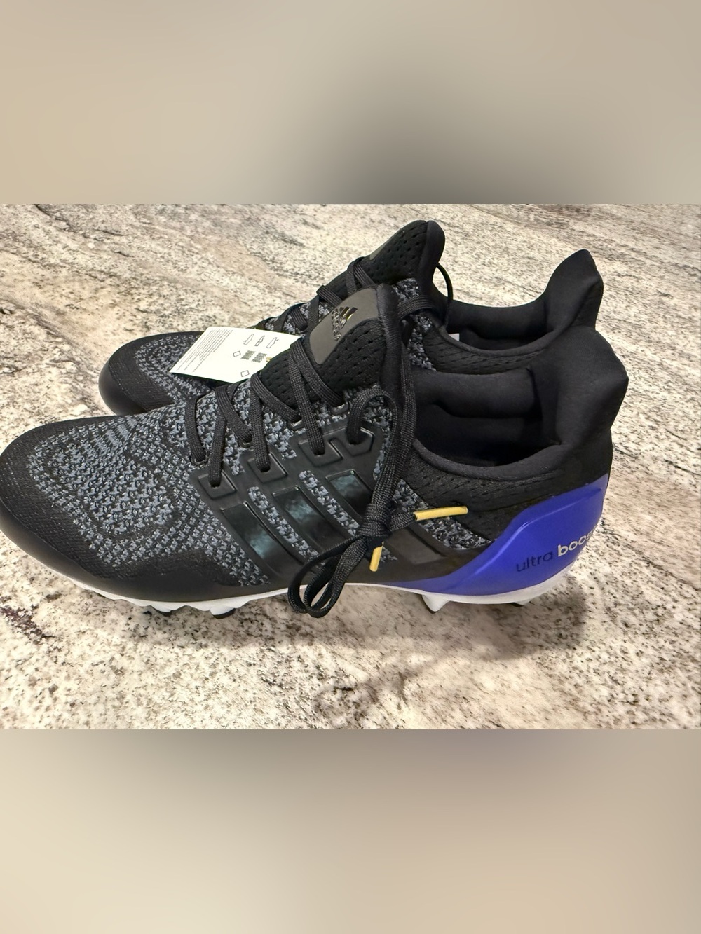 Adidas UltraBoost Cleats in Black and Blue/Purple